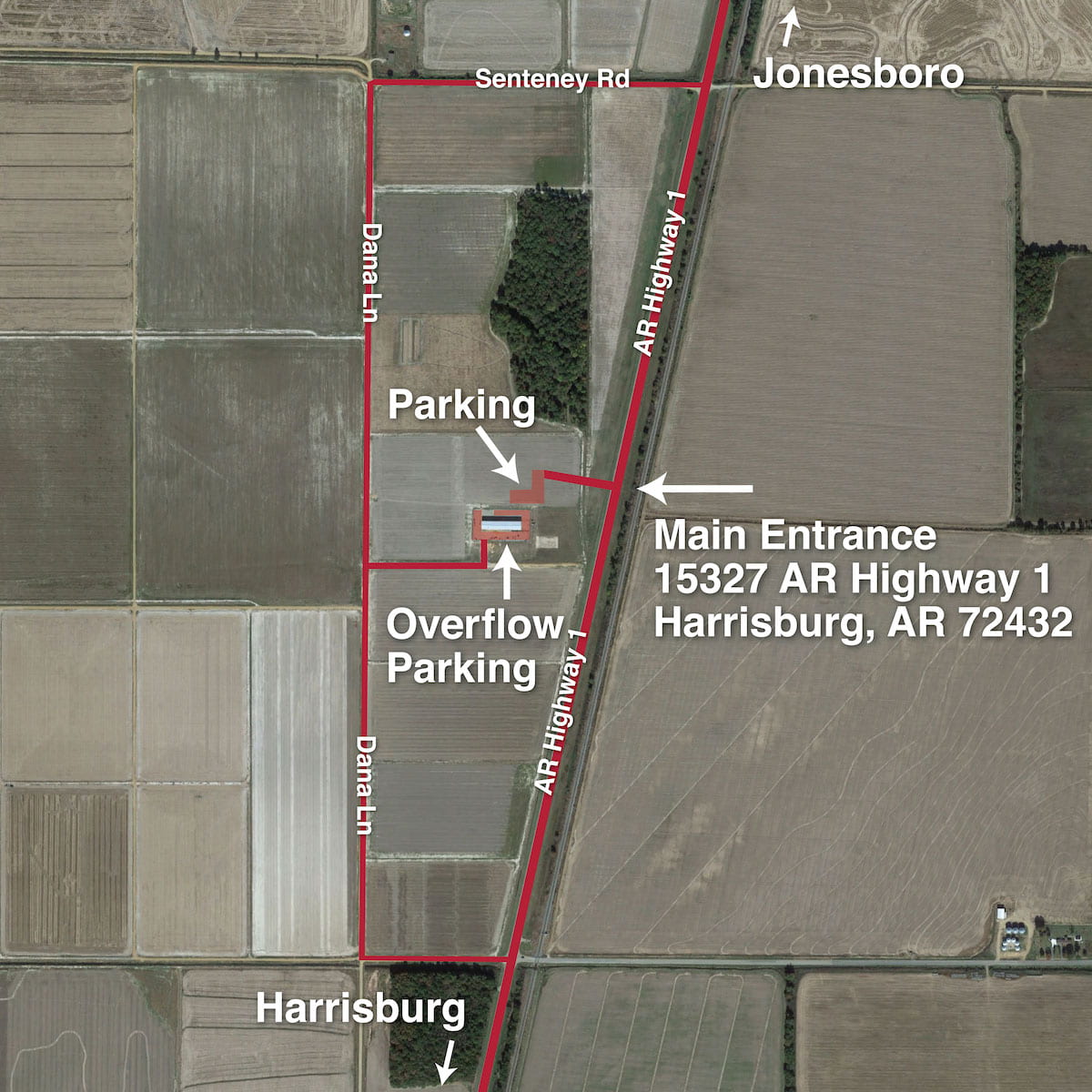 An overhead GPS map showing the roads and parking lots around the Northeast Rice Research and Extension Center. A main entrance is designated at 15327 AR Highway 1, Harrisburg, AR 72432. An arrow points to Jonesboro to the north and Harrisburg to the south.