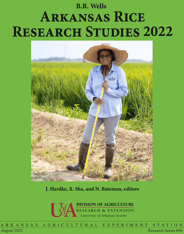 Cover of B.R. Wells Arkansas Rice Research Studies; woman standing in the farm field