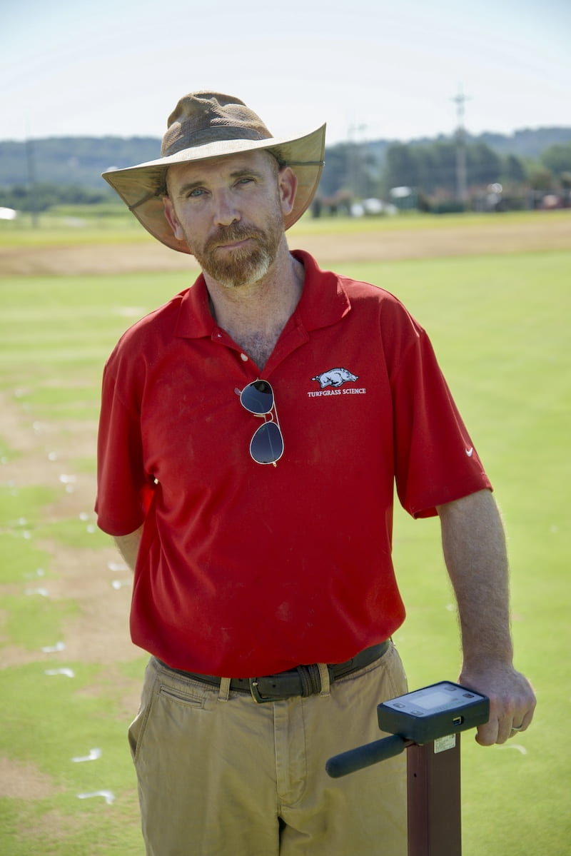TURF TALK — Daniel O'Brien recently presented talks on turfgrass research conducted at the Arkansas Agricultural Experiment Station to several renowned golfcourse management associations. (U of A System Division of Agriculture photo)